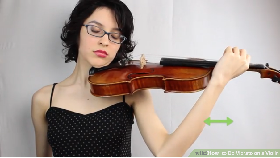 Để chơi vibrato bằng cánh tay, hãy bắt đầu với bước đầu tiên là học rung cổ tay