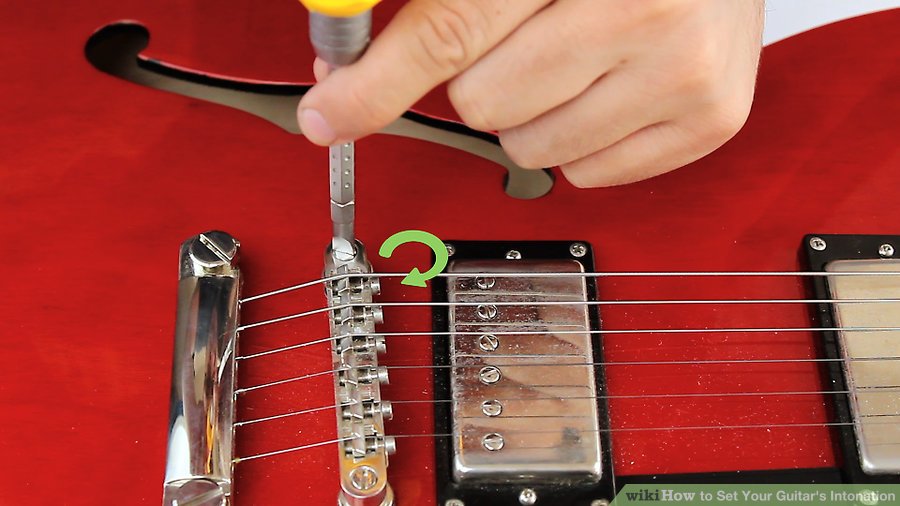 Điều chỉnh khoảng cách giữa dây đàn và bàn phím (action guitar)