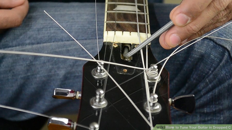 Điều chỉnh trục kim loại đàn Guitar về Drop C