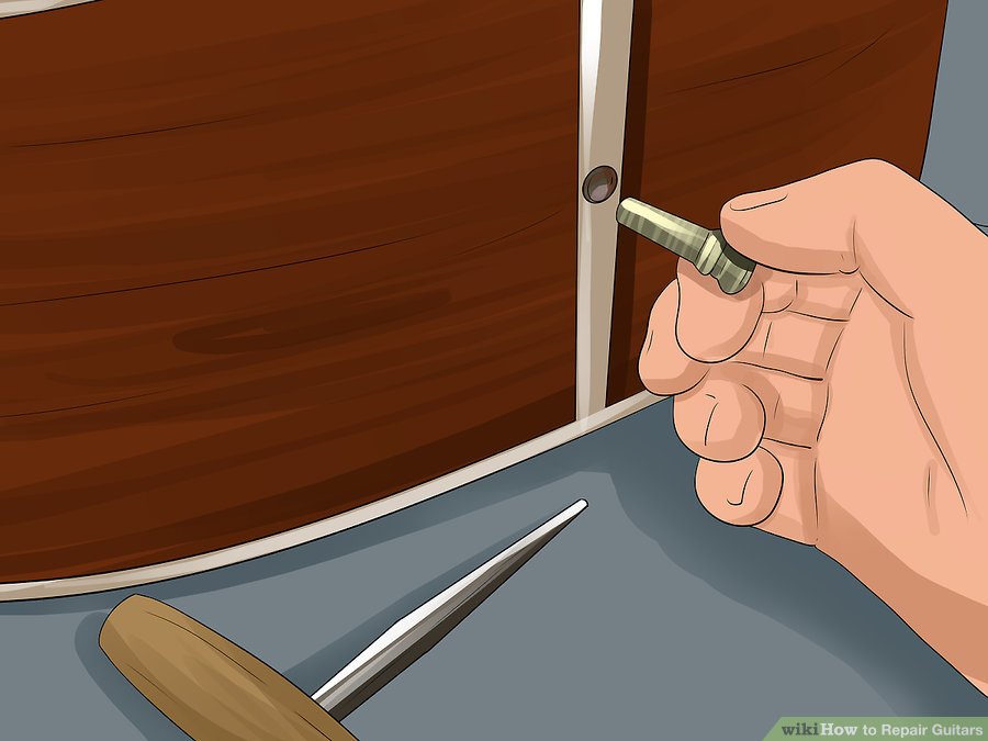 Sửa các nút gắn dây đai đàn Guitar