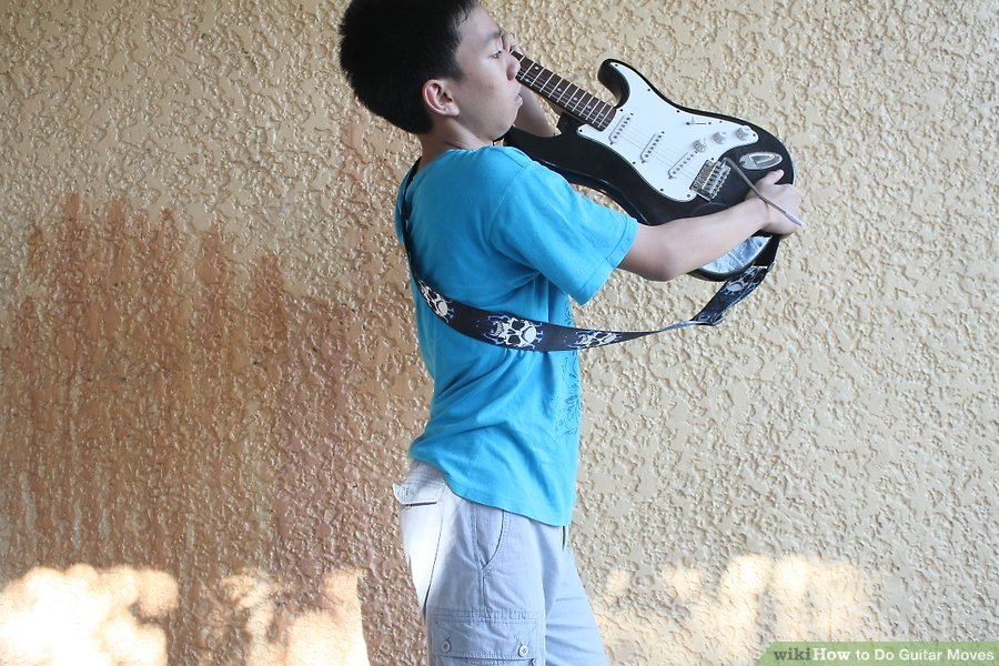 xoay-khi-choi-guitar